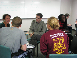 Professor Karl Haushalter discusses a reading with students