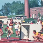 Tony Gnecco running on racetrack.