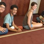 Students sitting on carpet