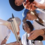 students working on rocket