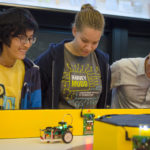 students competing in robotic vehicle competition