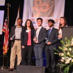 Gokli and students with awards