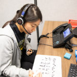 Student speaking doing math while on the phone
