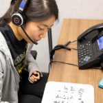 student tutor taking call