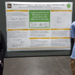 Lee and Nathan with poster presentation