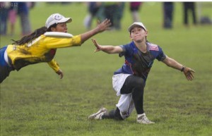 Tasha Arvanitis (right) receives a pass during a game against Team Colombia. Photo Credit: Yannis Arvanitis