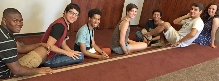 Students sitting on carpet