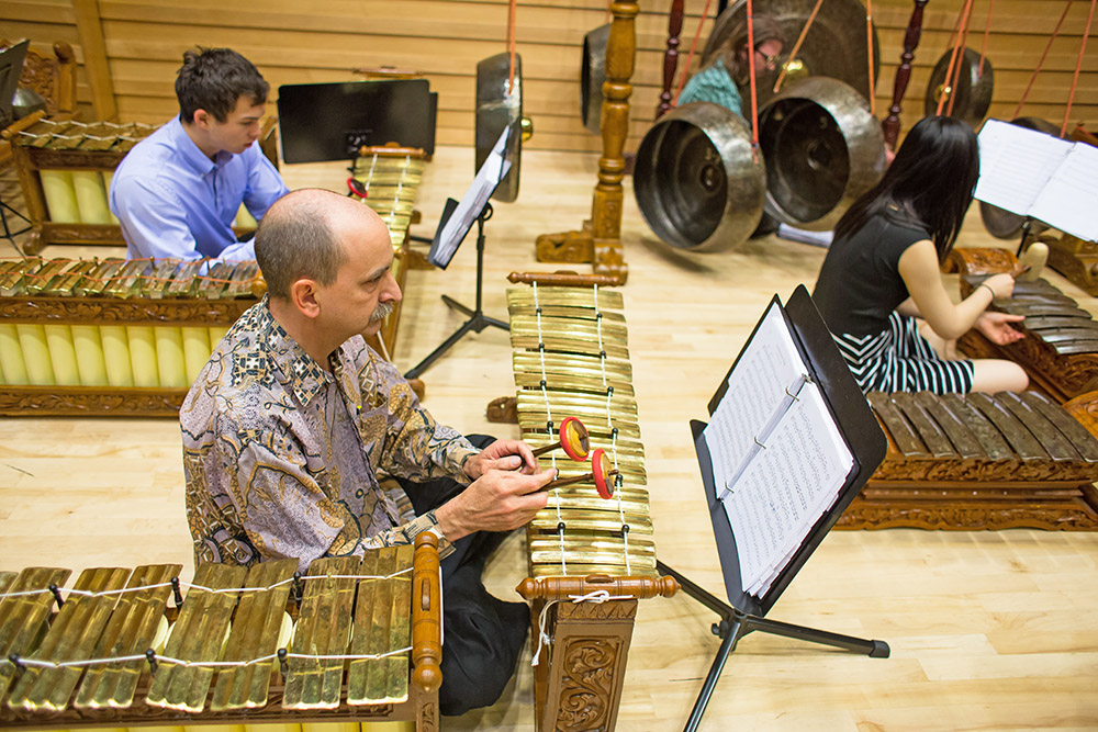 Alves playing gamelan