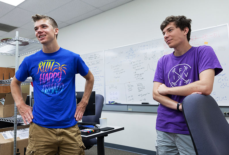 Kyle Lund and Sam Dietrich in Professor Jim Boerkoel's classroom