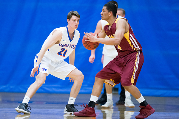 Miles President playing basketball.