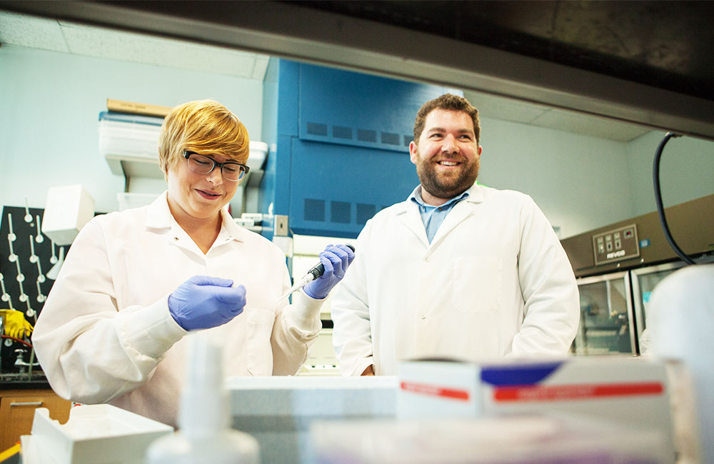 Professor of Biology Dan Stoebel with student