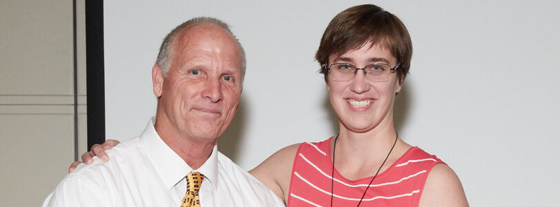 Coach John Goldhammer poses with 2017 CMS Hall of Fame InducteeKristina Orosz '04