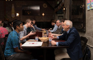 People talk at table.