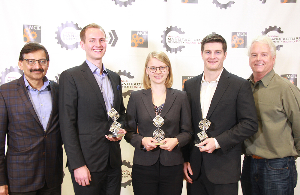 Students holding awards