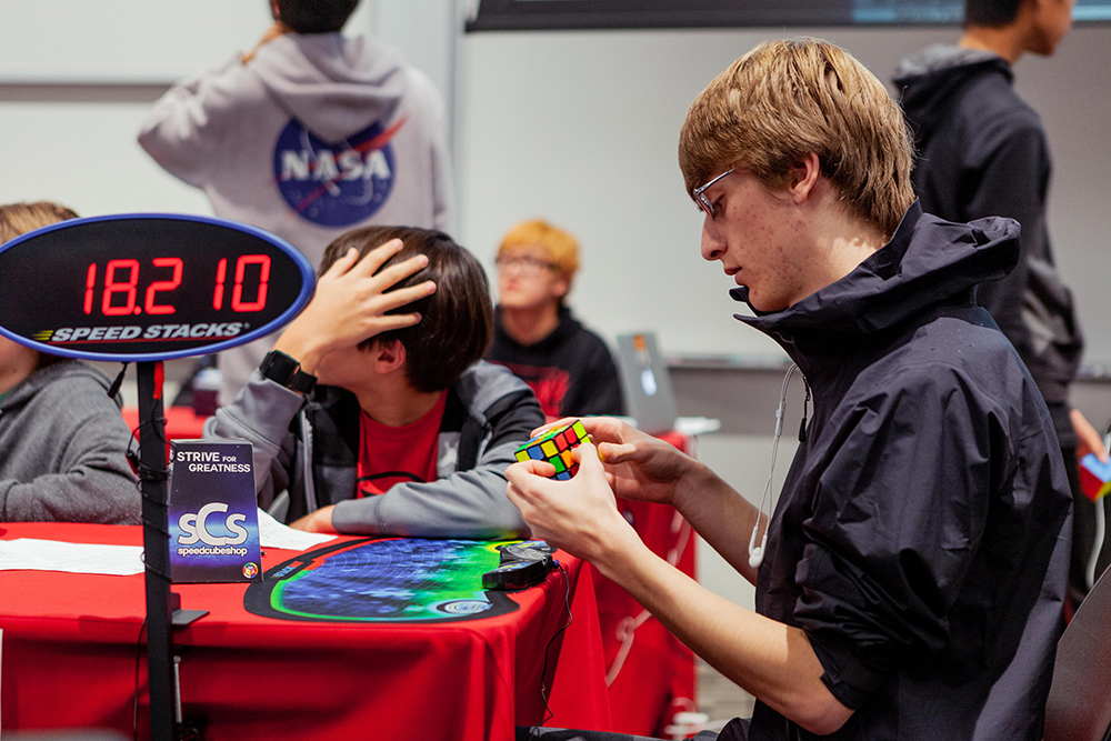 student with cube