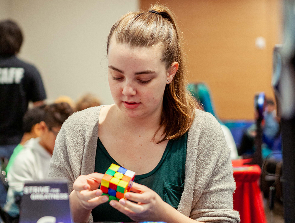 student with cube