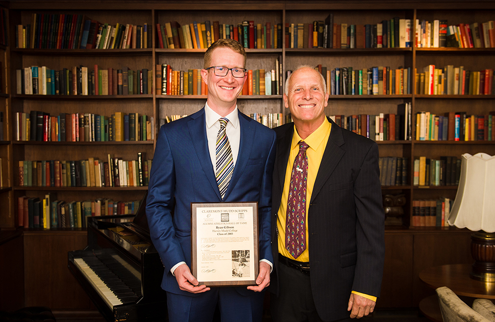 Ryan Gibson ’03 and CMS track and field coach (1984–present) John Goldhammer