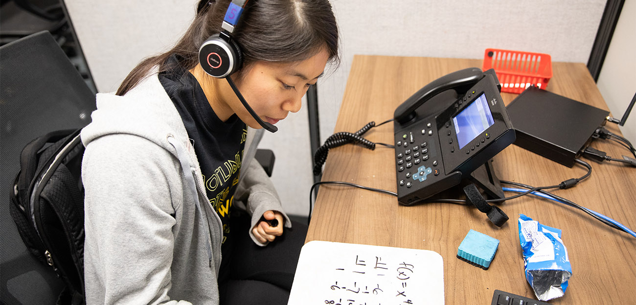 student tutor taking call