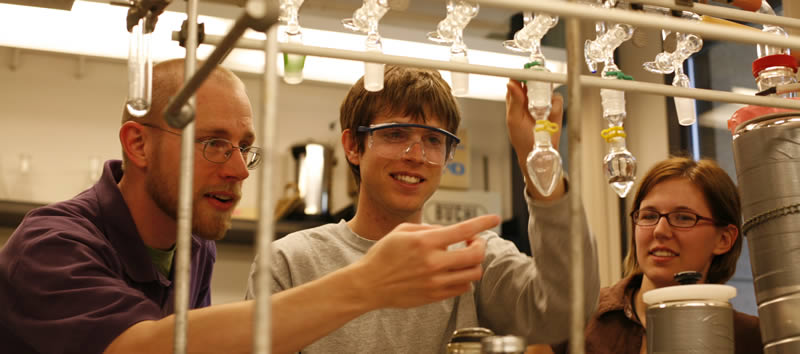 Students and professor in lab