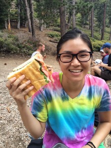 JZ with a piece of sandwich equal in mass to her head (approximately)