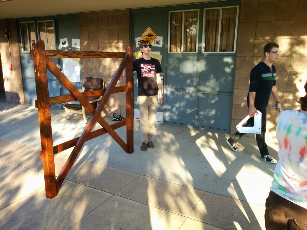 Andrew Bishop '18 leads the carpentry effort.