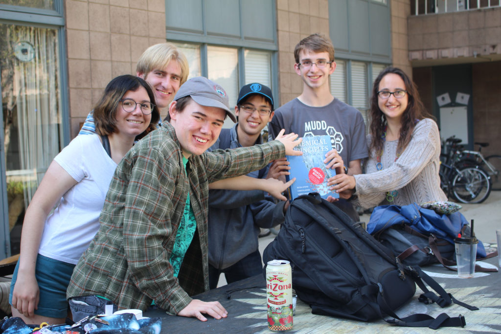 Six of East Dorm's frosh pose with the textbook for their chemistry class.