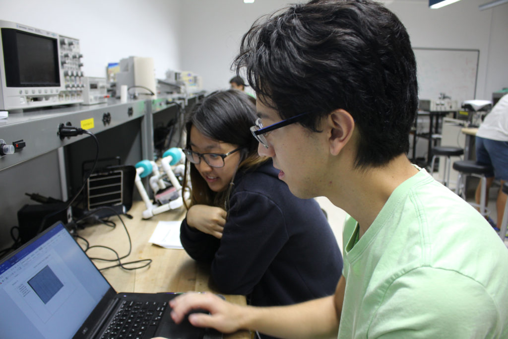 Sophomores Brandon and Celena working together on their systems and signals class.