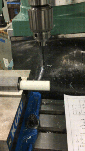 Drilling a hole in a PVC piece for the E4 ocarina project