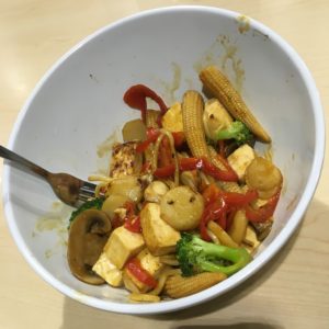 Custom stir fry with choose your own protein and toppings; tofu with baby corn, broccoli, bell pepper, mushroom, and water chestnut