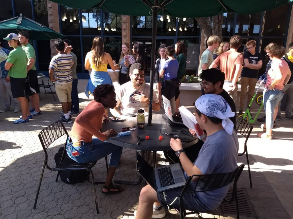 Students sitting at a table.