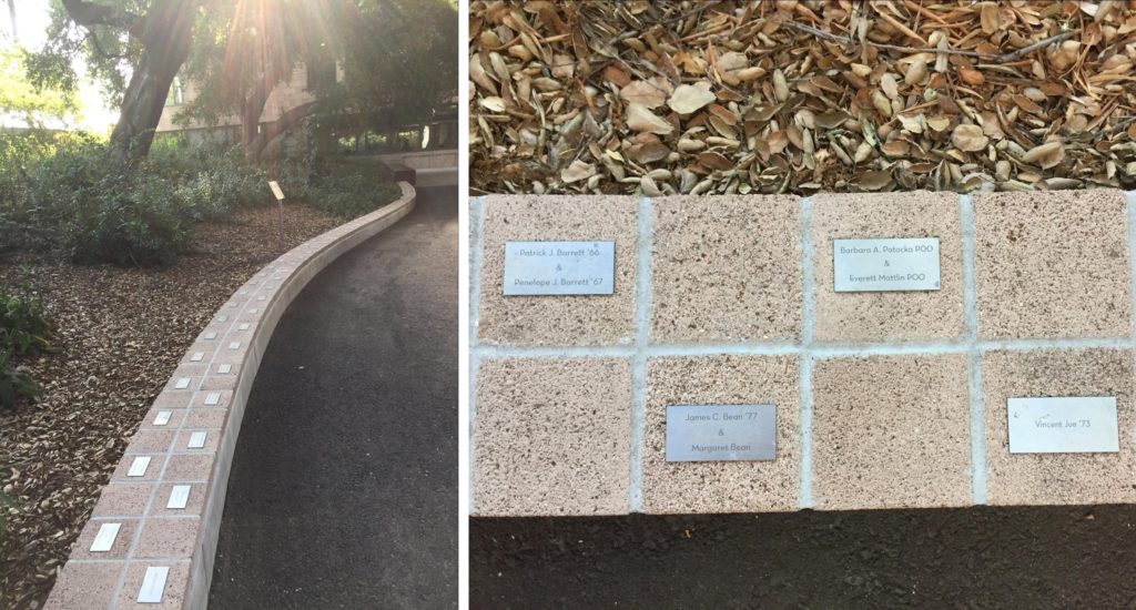 Left: A concrete pathway and a tree lined garden are separated by a short concrete wall covered in reddish square prisms Right: A close-up photo of some reddish-brown square prisms with plaques on them