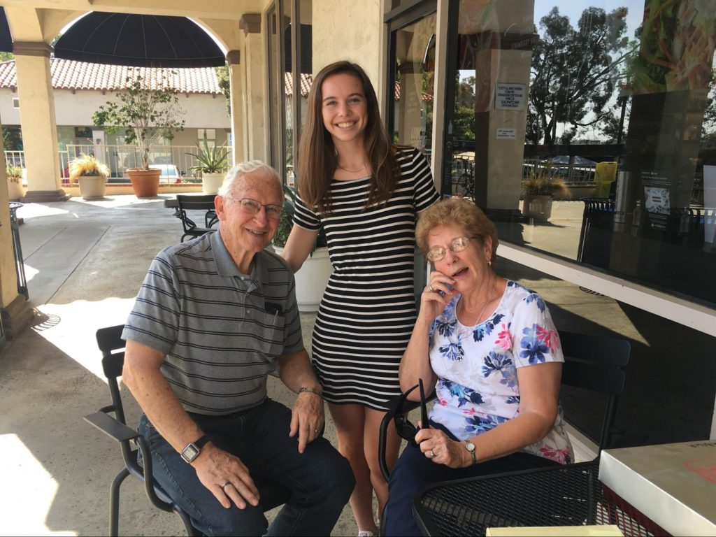 A photo of David and Merilyn Howell with Georgia standing between them