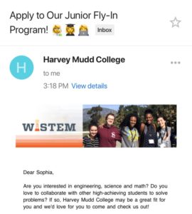 Screenshot from a mobile phone email app. The email subject is "Apply to our Fly-In Program!" There is a banner that says WISTEM with five young women standing together smiling. The message body says, "Dear Sophia, Are you interested in engineering, science and math? Do you love to collaborate with other high-achieving students to solve problems? If so, Harvey Mudd College may be a great fit for you and we'd love for you to come and check us out! "