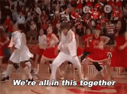 A moving picture of the High School Musical cast dancing and singing along to "We're all in this together".