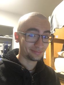 Image of Bald Joaquin. He has a bit of a goatee, but not much else