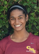 Picture of Aarthi wearing a red shirt that says CMS Soccer in gold letters blow a grey Nike checkmark. She is smiling and wearing a grey headband.