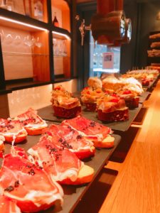 food placed on top of a restaurant bar