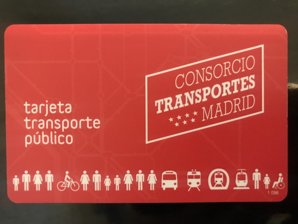 a red card that says “tarjeta transporte público