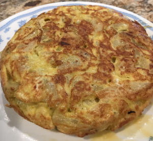 plate with egg omelette with potatoes