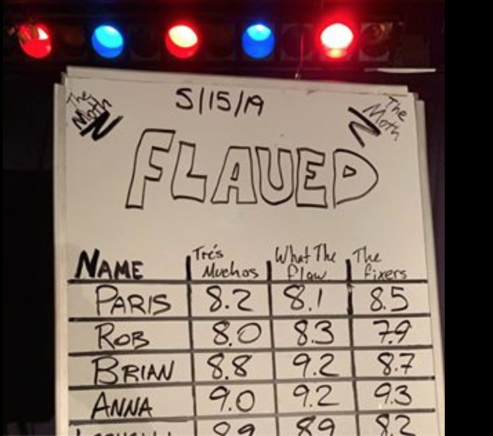 The scoreboard at a moth story slam event where the theme of the night was "flawed." Names are listed on the whiteboard along with the three scores from the judging teams