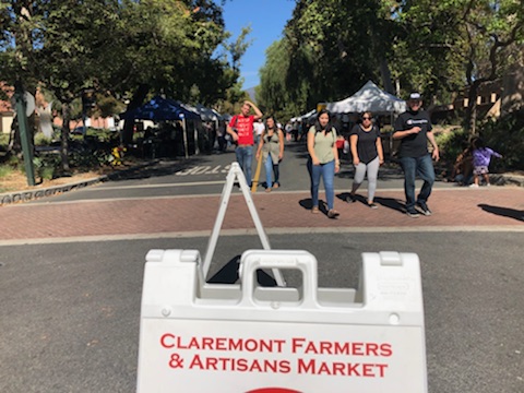 Sign reading "Claremont Farmers and Artisans Market"