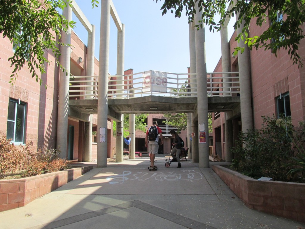 Entrance to a dorm with a balcony.