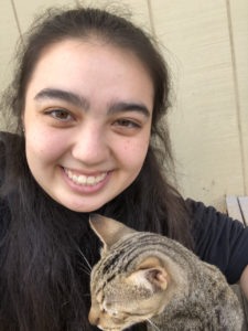 Alyssa Okimoto with cat.