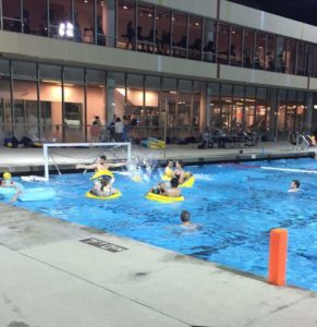 Students playing inner-tube water polo