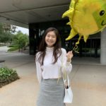 Jenny holding a balloon