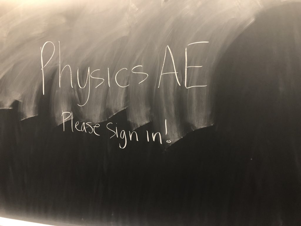 Chalkboard reading "Physics AE: Please sign in!"