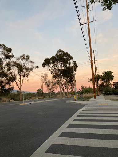 A sunset over a road