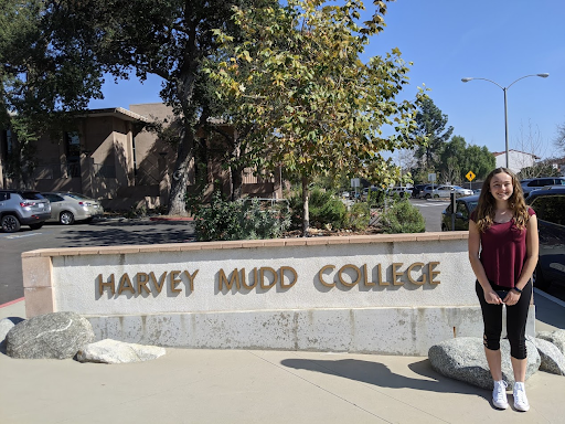 Mikayla in front of Harvey Mudd College sign.