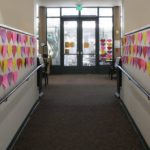 Image of paper hearts on walls.