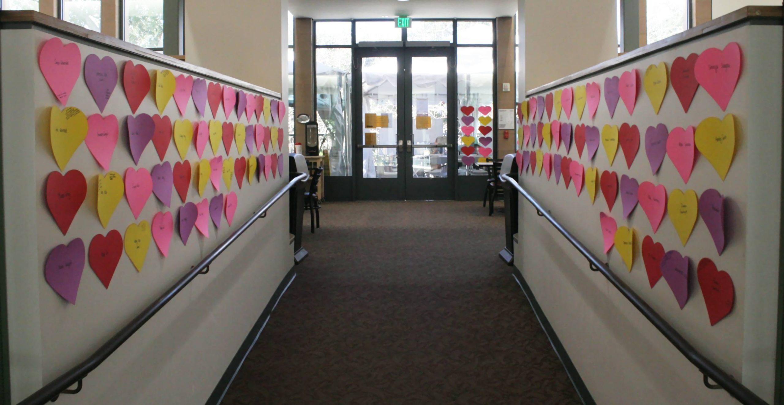 Image of paper hearts on walls.